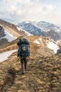 Tourist looks at mountains