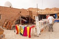 Tourist looks at souvenirs in a store in the Sahara desert in Tunisia