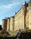 Tourist looks at Castle of Sedan