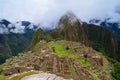 Tourist at Lost City of Machu Picchu - Peru Royalty Free Stock Photo