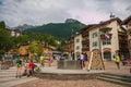 Tourist in the main square of Moena in Val di Fassa