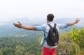 Tourist Man With Backpack Standing On Mountain Top Raised Hands Back Rear View Enjoy Beautiful Landscape Royalty Free Stock Photo