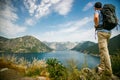 Tourist man enjoying sea view of the Bay of Kotor, Montenegro Royalty Free Stock Photo