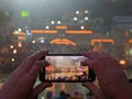 Filming the evening Hindu ceremony on the River Ganges in Hardiwar Royalty Free Stock Photo