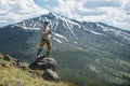 Tourist man photographer taking photos and enjoy the view of mountains in Yellowstone National Park Royalty Free Stock Photo