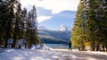 Tourist man travel to snowy mountains Royalty Free Stock Photo