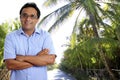 Tourist man in tropical palm tree caribbean Royalty Free Stock Photo