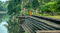 A tourist meets a young monk