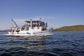 Tourist motor boat Rom full of tourists