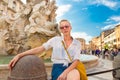 Tourist on Navona square in Rome.