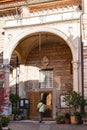 Tourist near entrance in Chiesa di San Lorenzo