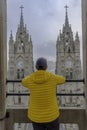 Tourist observing the Basilica National Vote Quito