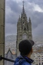 Tourist observing the Basilica National Vote Quito