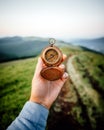 Tourist with old compass in hand Royalty Free Stock Photo