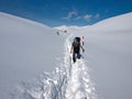 Tourist walking on a snow path