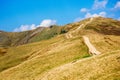 tourist path winding uphill the mountain ridge Royalty Free Stock Photo