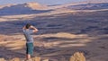 Tourist on the peak of Mount Negev are viewing a crater Makhtesh Ramon, Makhtesh Ramon, a geological phenomenon of Israel`s Negev