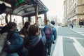 Tourist people enjoy the ride on the famous open tram in San Francisco