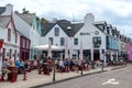 Tourist people sitting in the restaurant and coffee shop at Baltimore town Cork County Ireland