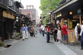 June 2018, Tourist people walking ancient street wooden buildings shops, Takayama, Japan