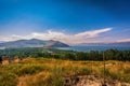 Tourist peoples using paid binocular and observing the beautiful view of Lake Sevan from the top of Sevanavank Mountain Royalty Free Stock Photo