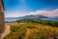 Tourist peoples using paid binocular and observing the beautiful view of Lake Sevan from the top of Sevanavank Mountain Royalty Free Stock Photo