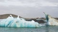 Tourist photographers take photo of glacier ice lagoon