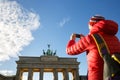 Tourist photographing Brandenburg gate, Berlin Royalty Free Stock Photo