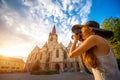 Tourist photographing ghotic cathedral in Romania