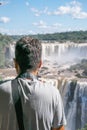 Tourist photographing the Iguassu Falls, in Foz do IguaÃÂ§u.