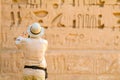 Tourist photographing-Medinet Habu Temple Egypt