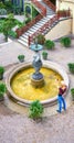 Tourist photographing the Schwerin Castle Fountain. Mecklenburg-Vorpommern, Germany