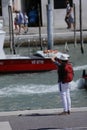 Tourist photographing Venice canals