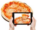 Tourist photographs of italian pizza Margherita Royalty Free Stock Photo