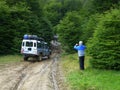 Tourist photographs a jeep on an impassable road, Tierra del Fuego, Argentina