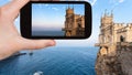 tourist photographs Swallow Nest castle in Crimea Royalty Free Stock Photo