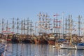 Tourist pirate sailing ships near the pier in the Mediterranean Sea on the sunset. Port of Kemer, Turkey Royalty Free Stock Photo