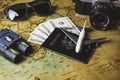 Tourist planning props and travel accessories with American passport, airplane, digital camera, telescope, sunglasses and US