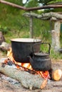 Tourist pot over camp fire Royalty Free Stock Photo