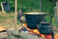 Tourist pot over camp fire Royalty Free Stock Photo