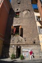 Tourist reading information at the entrance to Prendiparte tower