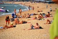 Tourist relaxing on the Beach