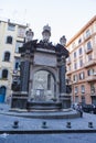 Tourist relaxing and the gate in front of Chiesa Stella Maris