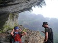 Tourist relaxing in Hinku Cave, Nepal Royalty Free Stock Photo