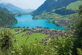 tourist resort Lungern and lake Lungernsee, view from Brunig pass road Royalty Free Stock Photo