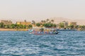 Tourist riverboat cruising on the Nile in Luxor, Egypt