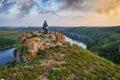 Tourist on the rock. the girl looks at the picturesque canyon