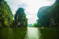 Tourist rows boat for signseeing at Ninh Binh
