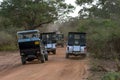 Tourist safari jeeps exit Yala National Park at Tissamaharama in Sri Lanka.