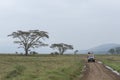 Tourist safari vehical watching game at Lake Nakuru in Kenya